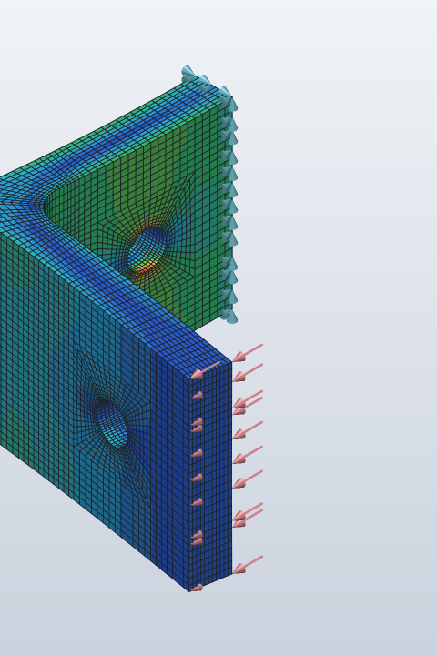 Von Mises stress peaking at the hole, with the clamp cones and load arrows
